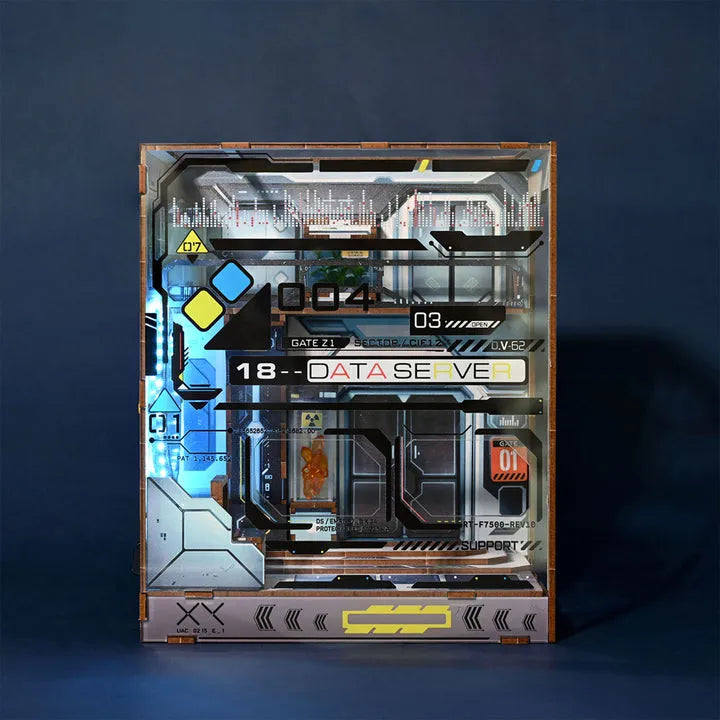 Book Nook - Alien Hub, un kit créatif pour construire un diorama miniature. Parfait pour décorer une bibliothèque ou comme cadeau original pour un amoureux des livres. Par Nookette.