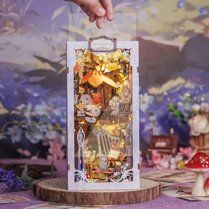Book Nook - Flower Forest Concert, un kit créatif pour construire un diorama miniature. Parfait pour décorer une bibliothèque ou comme cadeau original pour un amoureux des livres. Par Nookette.