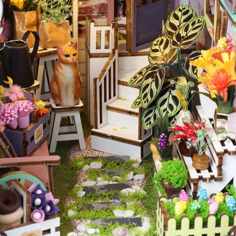 Book Nook - Flower House, un kit créatif pour construire un diorama miniature. Parfait pour décorer une bibliothèque ou comme cadeau original pour un amoureux des livres. Par Nookette.