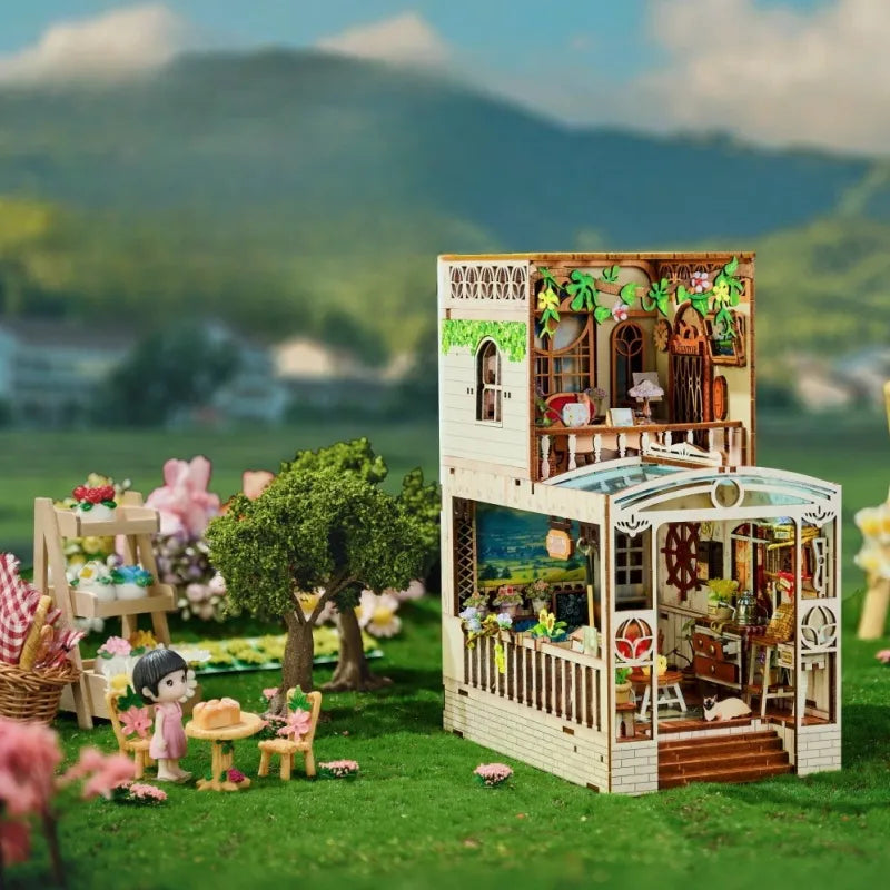 Book Nook - Happy Moments, un kit créatif pour construire un diorama miniature. Parfait pour décorer une bibliothèque ou comme cadeau original pour un amoureux des livres. Par Nookette.