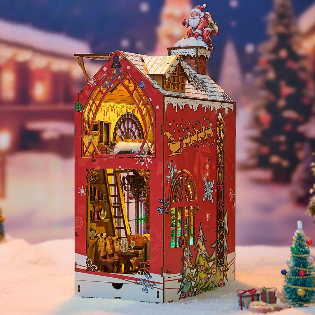 Book Nook - Merry Christmas, un kit créatif pour construire un diorama miniature. Parfait pour décorer une bibliothèque ou comme cadeau original pour un amoureux des livres. Par Nookette.