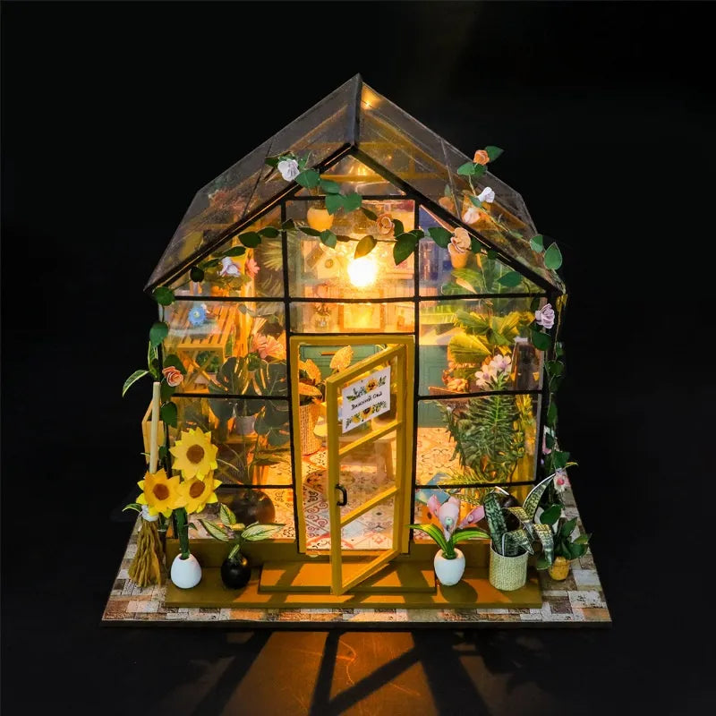 Book Nook - Sunshine Flower House, un kit créatif pour construire un diorama miniature. Parfait pour décorer une bibliothèque ou comme cadeau original pour un amoureux des livres. Par Nookette.