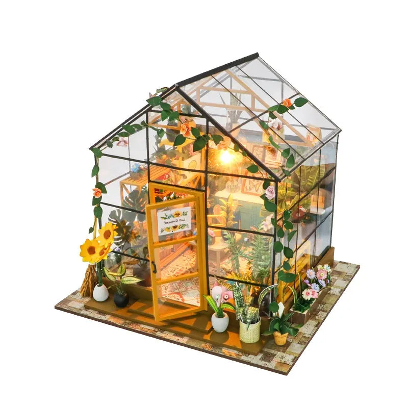 Book Nook - Sunshine Flower House, un kit créatif pour construire un diorama miniature. Parfait pour décorer une bibliothèque ou comme cadeau original pour un amoureux des livres. Par Nookette.