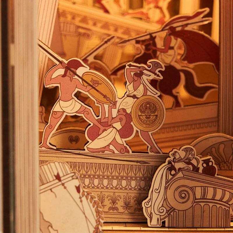 Booknook - The Legend of the Amazons, un kit créatif pour construire un diorama miniature. Parfait pour décorer une bibliothèque ou comme cadeau original pour un amoureux des livres. Par Nookette.