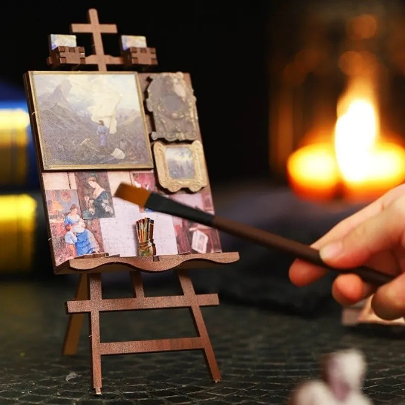 Book Nook - Wonder Studio, un kit créatif pour construire un diorama miniature. Parfait pour décorer une bibliothèque ou comme cadeau original pour un amoureux des livres. Par Nookette.