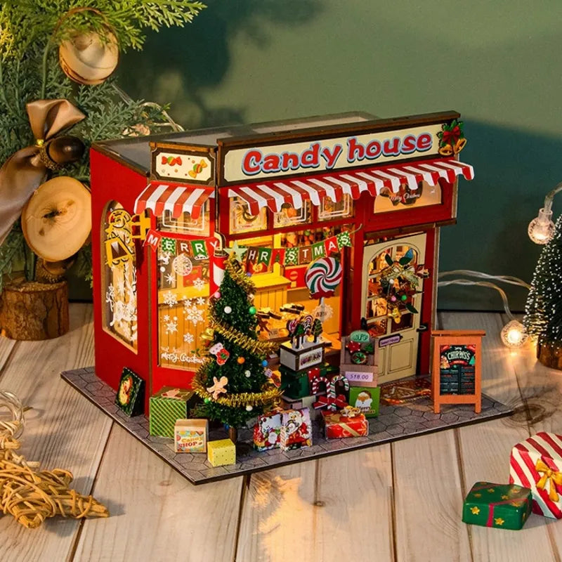 Maison Miniature - Candy House, un kit créatif pour construire un diorama miniature. Parfait pour décorer une bibliothèque ou comme cadeau original pour un amoureux des livres. Par Nookette.