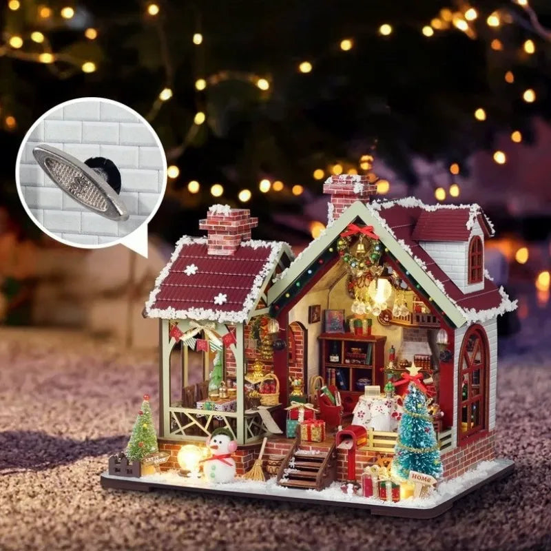 Maison Miniature - Warm Christmas Lodge, un kit créatif pour construire un diorama miniature. Parfait pour décorer une bibliothèque ou comme cadeau original pour un amoureux des livres. Par Nookette.