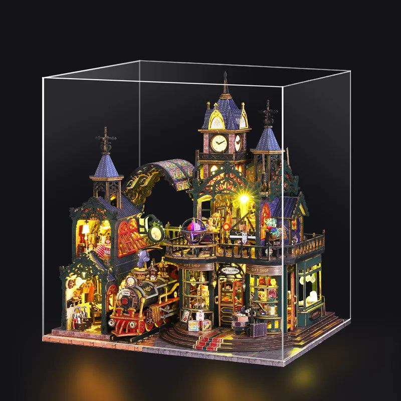 Maison Miniature - Rail Track Secluded City, un kit créatif pour construire un diorama miniature. Parfait pour décorer une bibliothèque ou comme cadeau original pour un amoureux des livres. Par Nookette.