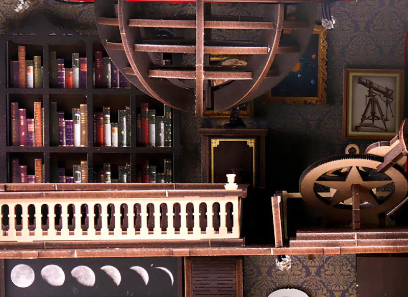 La bibliothèque au mur est remplie de matériel d'exploration du ciel