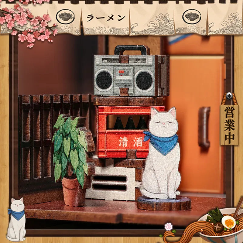 Le chat assis à la porte