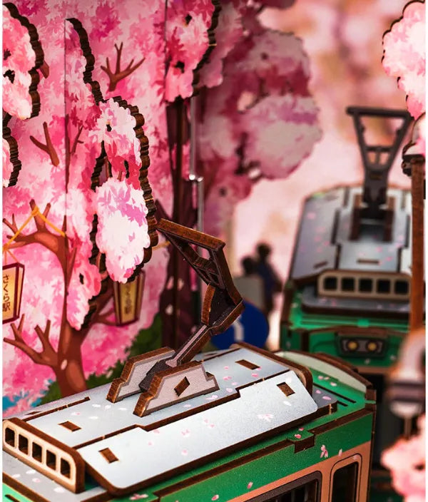 Les différents chariots allaient jusqu'au bout de la forêt de cerisiers en fleurs