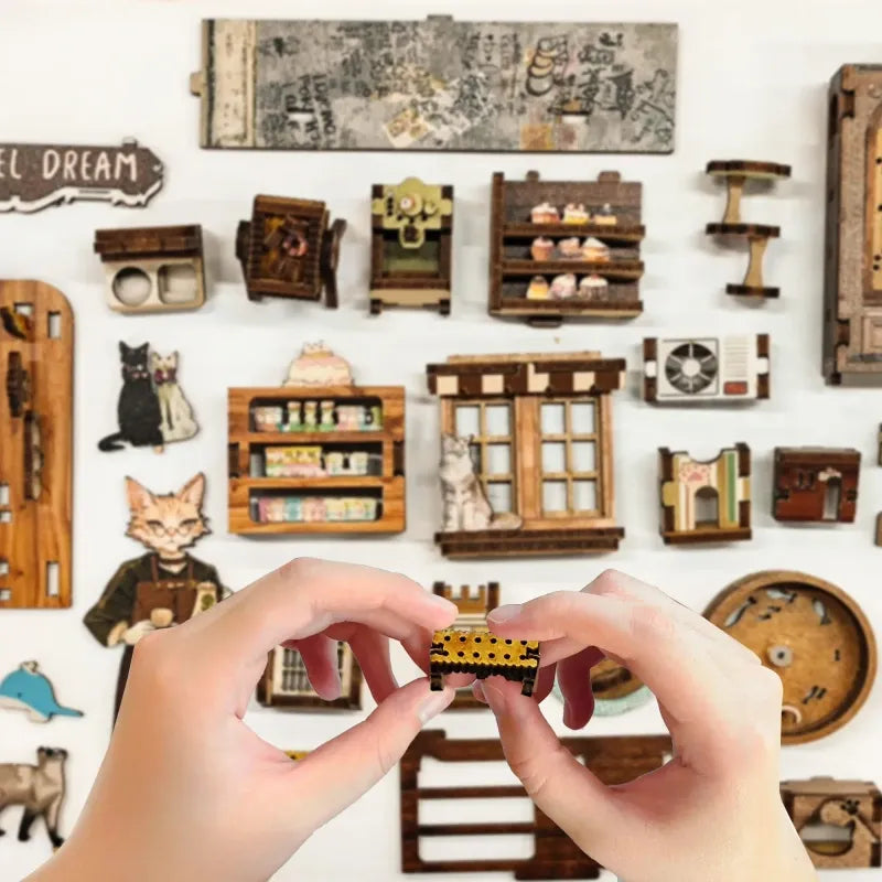 Booknook - Caramel Dreams Cat Café, un kit créatif pour construire un diorama miniature. Parfait pour décorer une bibliothèque ou comme cadeau original pour un amoureux des livres. Par Nookette.