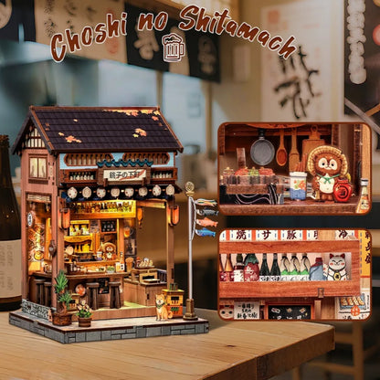 Book Nook Japan - Choshi no Shitamachi, un kit créatif pour construire un diorama miniature. Parfait pour décorer une bibliothèque ou comme cadeau original pour un amoureux des livres. Par Nookette.
