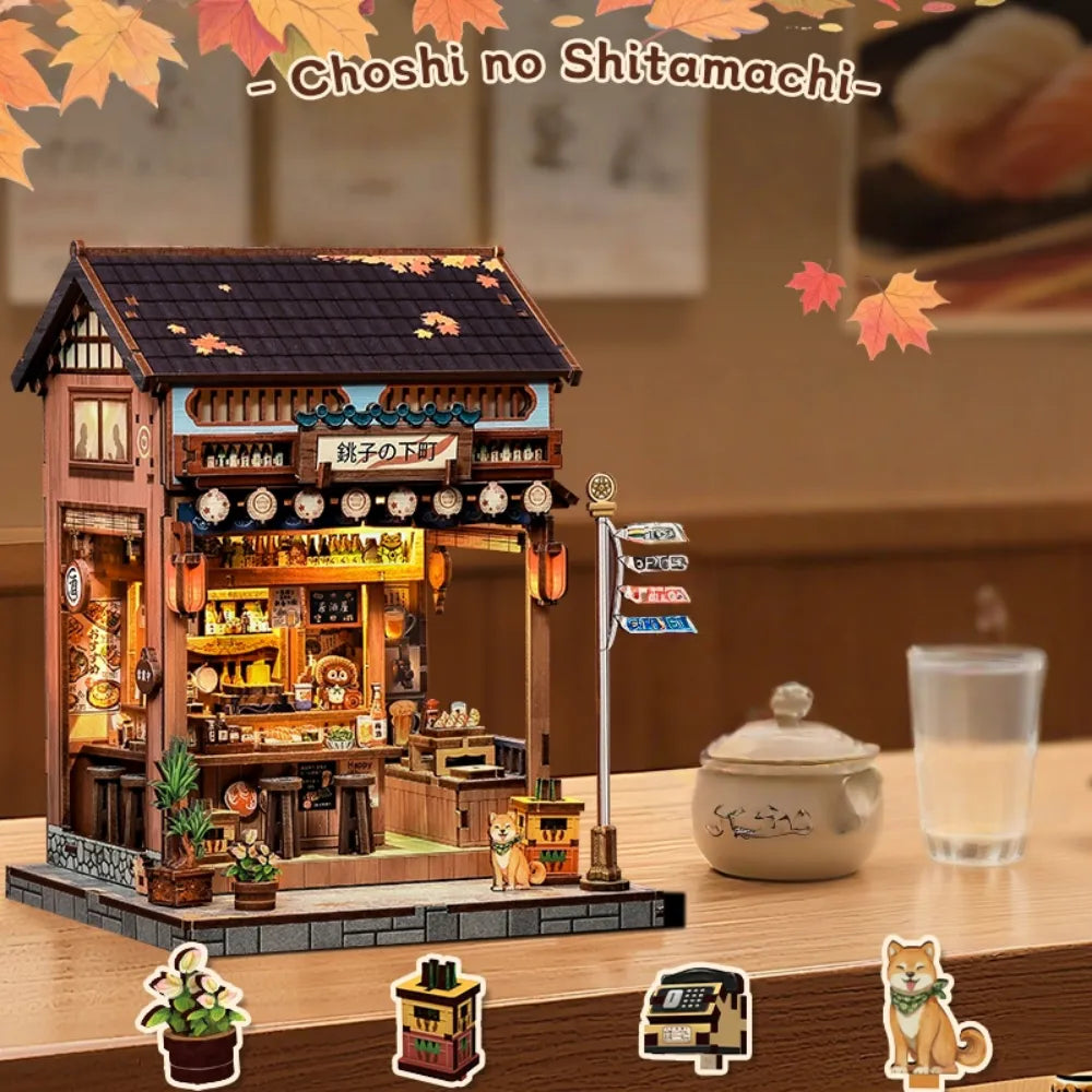 Book Nook Japan - Choshi no Shitamachi, un kit créatif pour construire un diorama miniature. Parfait pour décorer une bibliothèque ou comme cadeau original pour un amoureux des livres. Par Nookette.