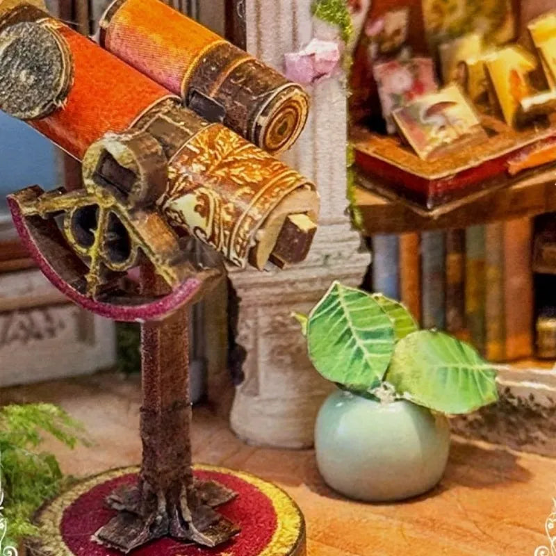 Book Nook - Dreamland Floral Studio, un kit créatif pour construire un diorama miniature. Parfait pour décorer une bibliothèque ou comme cadeau original pour un amoureux des livres. Par Nookette.