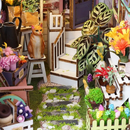 Book Nook - Flower House, un kit créatif pour construire un diorama miniature. Parfait pour décorer une bibliothèque ou comme cadeau original pour un amoureux des livres. Par Nookette.