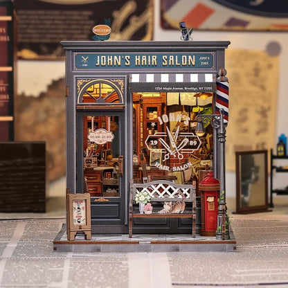 Book Nook - John's Hair Salon, un kit créatif pour construire un diorama miniature. Parfait pour décorer une bibliothèque ou comme cadeau original pour un amoureux des livres. Par Nookette.