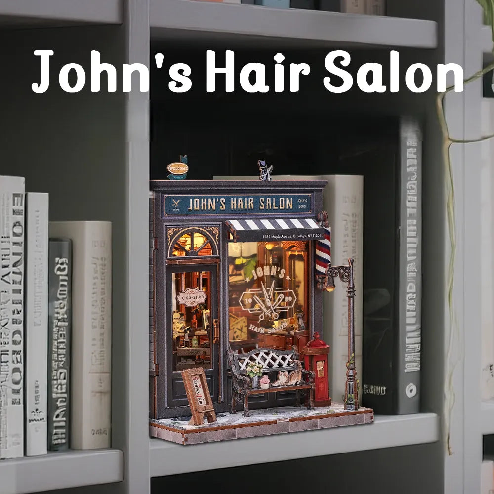 Book Nook - John's Hair Salon, un kit créatif pour construire un diorama miniature. Parfait pour décorer une bibliothèque ou comme cadeau original pour un amoureux des livres. Par Nookette.
