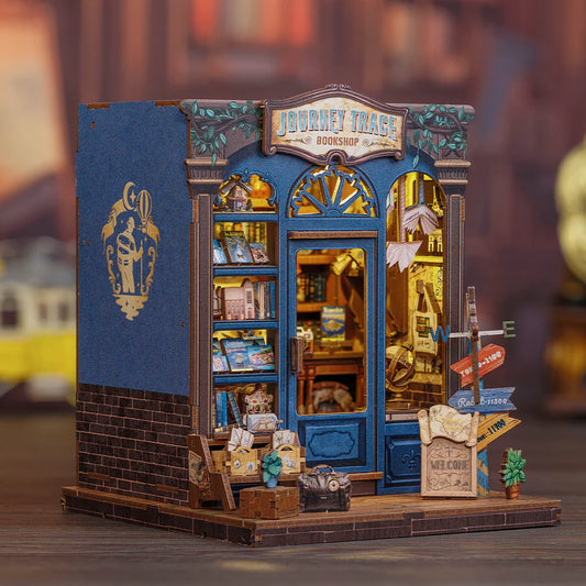 Book Nook - Journey Trace Bookshop, un kit créatif pour construire un diorama miniature. Parfait pour décorer une bibliothèque ou comme cadeau original pour un amoureux des livres. Par Nookette.