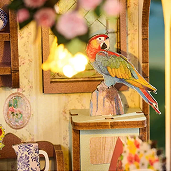 Un perroquet multicolore regarde curieusement entre les fleurs odorantes