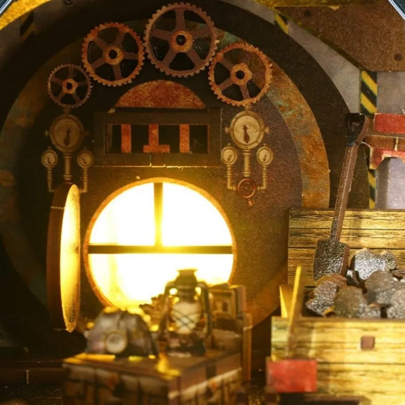 Book Nook - Mechanical Rhythm, un kit créatif pour construire un diorama miniature. Parfait pour décorer une bibliothèque ou comme cadeau original pour un amoureux des livres. Par Nookette.