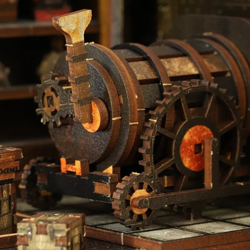 Book Nook - Mechanical Rhythm, un kit créatif pour construire un diorama miniature. Parfait pour décorer une bibliothèque ou comme cadeau original pour un amoureux des livres. Par Nookette.