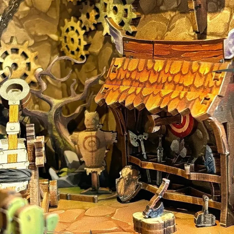 Book Nook - Mining Zone Fortress, un kit créatif pour construire un diorama miniature. Parfait pour décorer une bibliothèque ou comme cadeau original pour un amoureux des livres. Par Nookette.