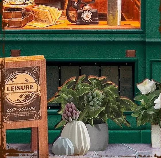 Book Nook - Moments In Time, un kit créatif pour construire un diorama miniature. Parfait pour décorer une bibliothèque ou comme cadeau original pour un amoureux des livres. Par Nookette.