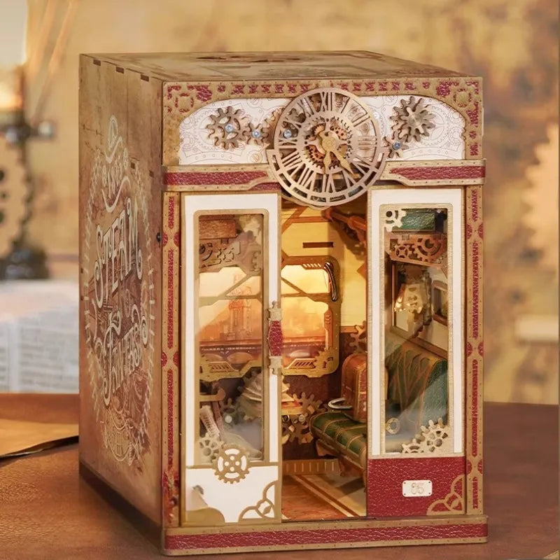 Book Nook - Steam Fantasy, un kit créatif pour construire un diorama miniature. Parfait pour décorer une bibliothèque ou comme cadeau original pour un amoureux des livres. Par Nookette.