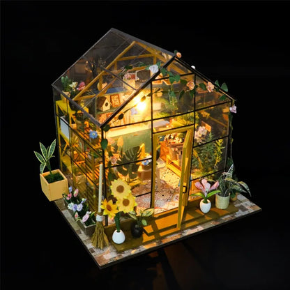 Book Nook - Sunshine Flower House, un kit créatif pour construire un diorama miniature. Parfait pour décorer une bibliothèque ou comme cadeau original pour un amoureux des livres. Par Nookette.