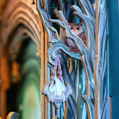 Chouette dans un trou d'arbre