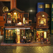 Maison Miniature - Twilight Book City, un kit créatif pour construire un diorama miniature. Parfait pour décorer une bibliothèque ou comme cadeau original pour un amoureux des livres. Par Nookette.