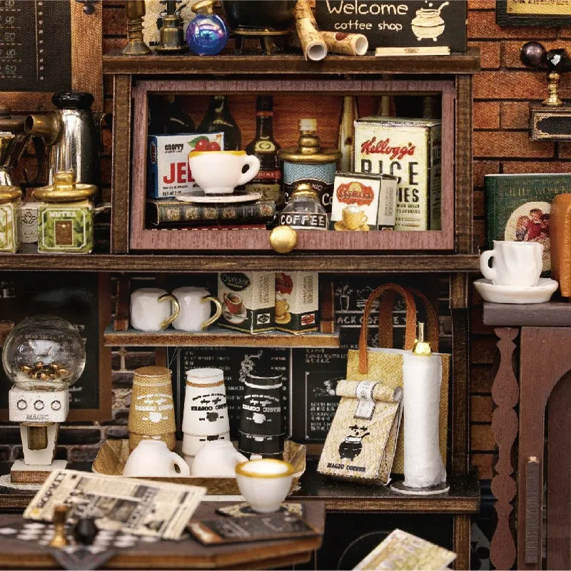 Maison Miniature - Vintage Coffee Shop, un kit créatif pour construire un diorama miniature. Parfait pour décorer une bibliothèque ou comme cadeau original pour un amoureux des livres. Par Nookette.
