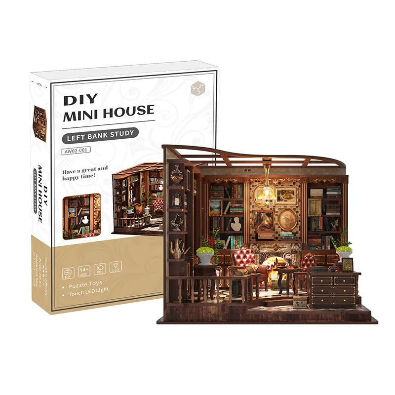 Maison Miniature - Left Bank Study, un kit créatif pour construire un diorama miniature. Parfait pour décorer une bibliothèque ou comme cadeau original pour un amoureux des livres. Par Nookette.