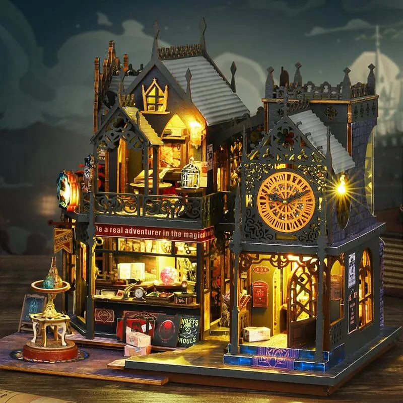 Maison Miniature - Holo Magic City, un kit créatif pour construire un diorama miniature. Parfait pour décorer une bibliothèque ou comme cadeau original pour un amoureux des livres. Par Nookette.