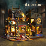 Maison Miniature - Holo Magic City, un kit créatif pour construire un diorama miniature. Parfait pour décorer une bibliothèque ou comme cadeau original pour un amoureux des livres. Par Nookette.