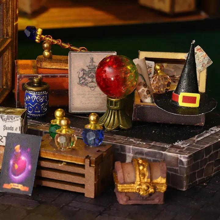 Maison Miniature - Magic Treasure House, un kit créatif pour construire un diorama miniature. Parfait pour décorer une bibliothèque ou comme cadeau original pour un amoureux des livres. Par Nookette.