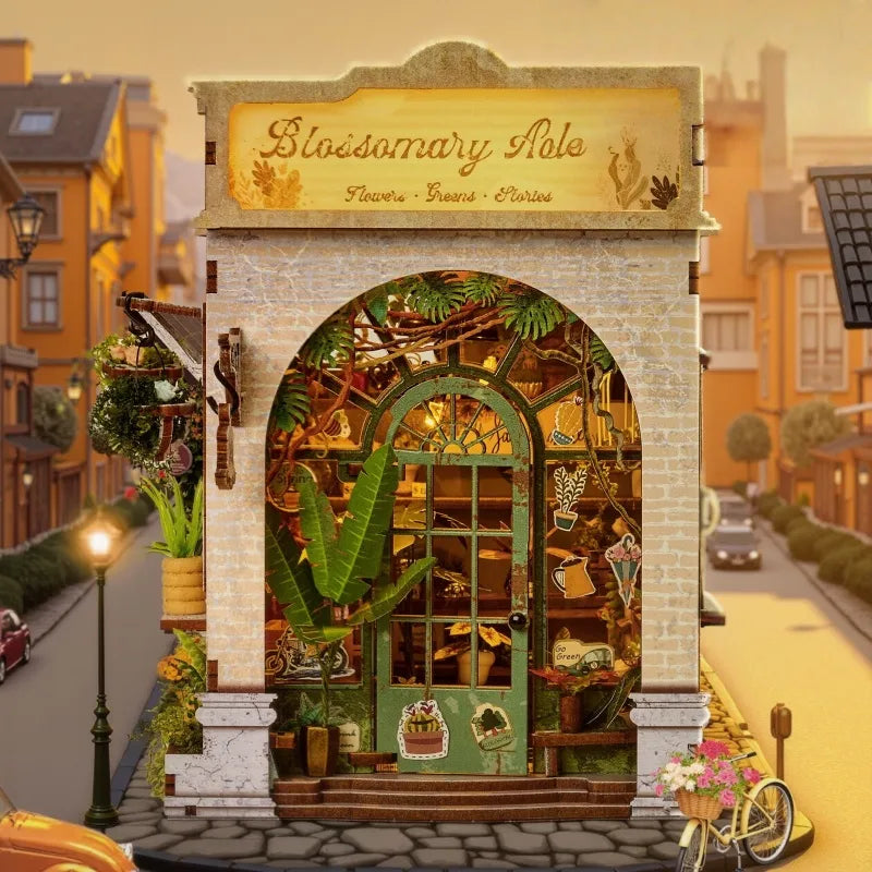 Maison Miniature - Blossomary Atelier, un kit créatif pour construire un diorama miniature. Parfait pour décorer une bibliothèque ou comme cadeau original pour un amoureux des livres. Par Nookette.