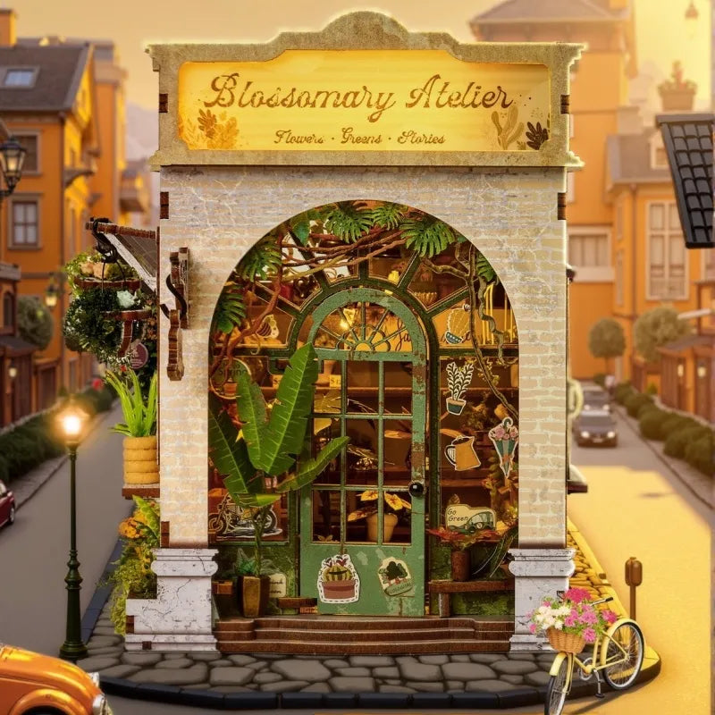 Maison Miniature - Blossomary Atelier, un kit créatif pour construire un diorama miniature. Parfait pour décorer une bibliothèque ou comme cadeau original pour un amoureux des livres. Par Nookette.