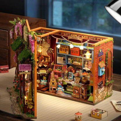 Maison Miniature - Dollhouse Shop, un kit créatif pour construire un diorama miniature. Parfait pour décorer une bibliothèque ou comme cadeau original pour un amoureux des livres. Par Nookette.