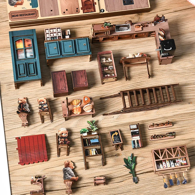 Maison Miniature - Bear Restaurant, un kit créatif pour construire un diorama miniature. Parfait pour décorer une bibliothèque ou comme cadeau original pour un amoureux des livres. Par Nookette.