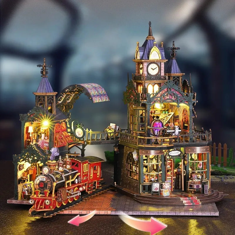 Maison Miniature - Rail Track Secluded City, un kit créatif pour construire un diorama miniature. Parfait pour décorer une bibliothèque ou comme cadeau original pour un amoureux des livres. Par Nookette.